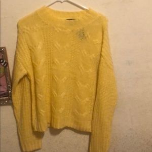 A yellow sweater